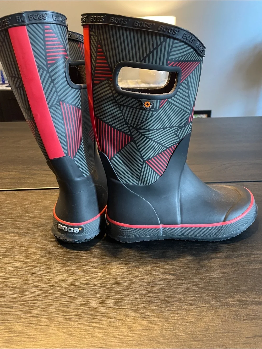 Bogs Black Rain Boots with Red Accents